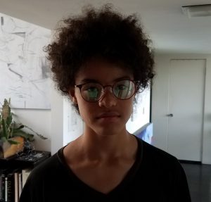 teen wearing glasses